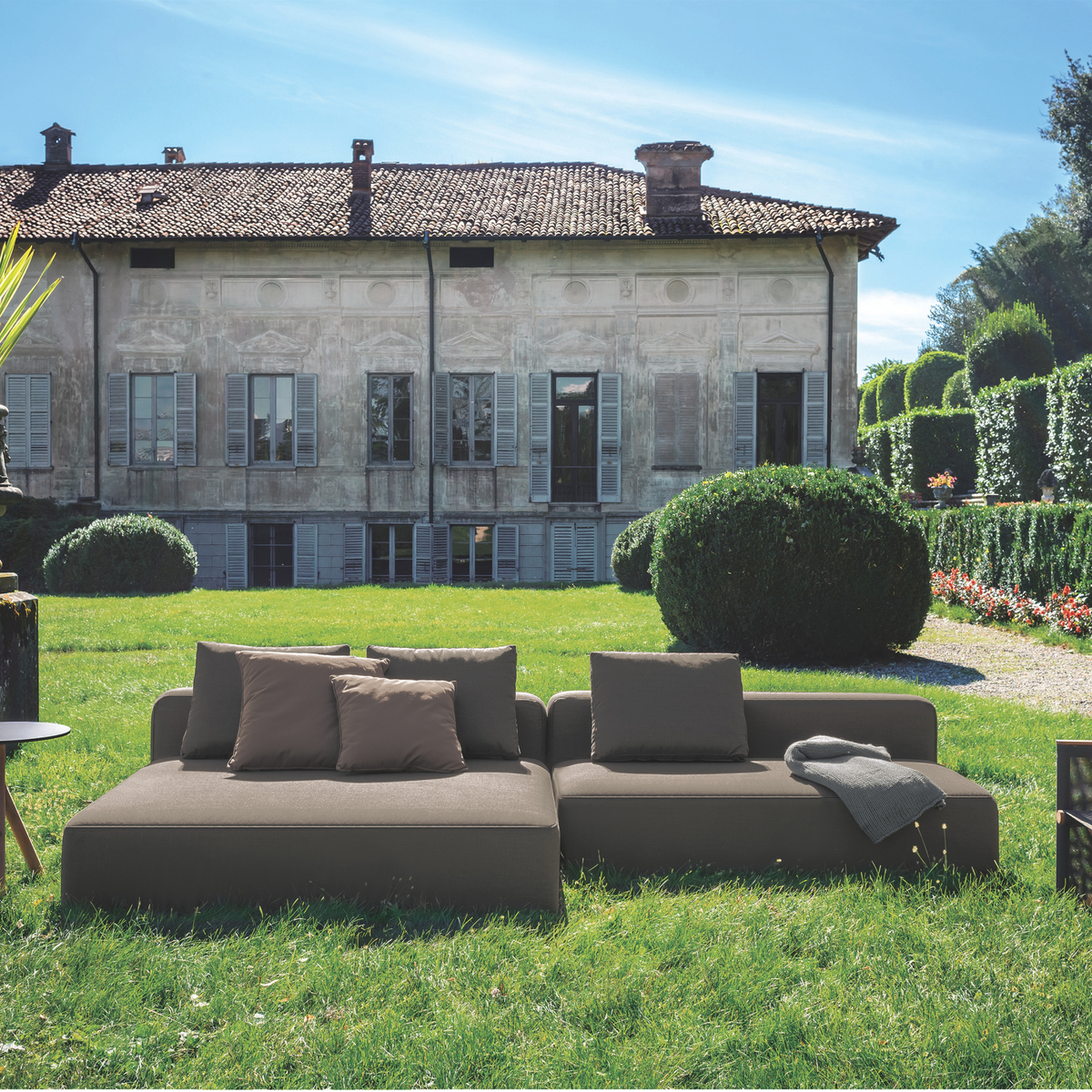 Roda Dandy Sofa Composition 3 long outdoor sofa with chaise end and armrests by Rodolfo Dordoni